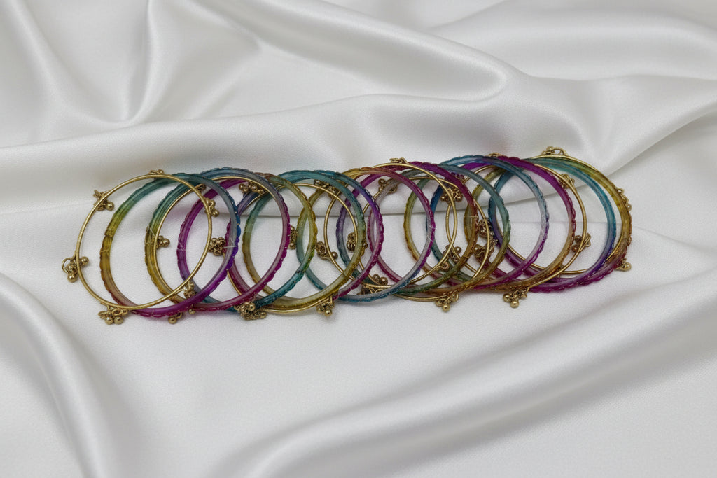 Set of colorful bangles on a white background
