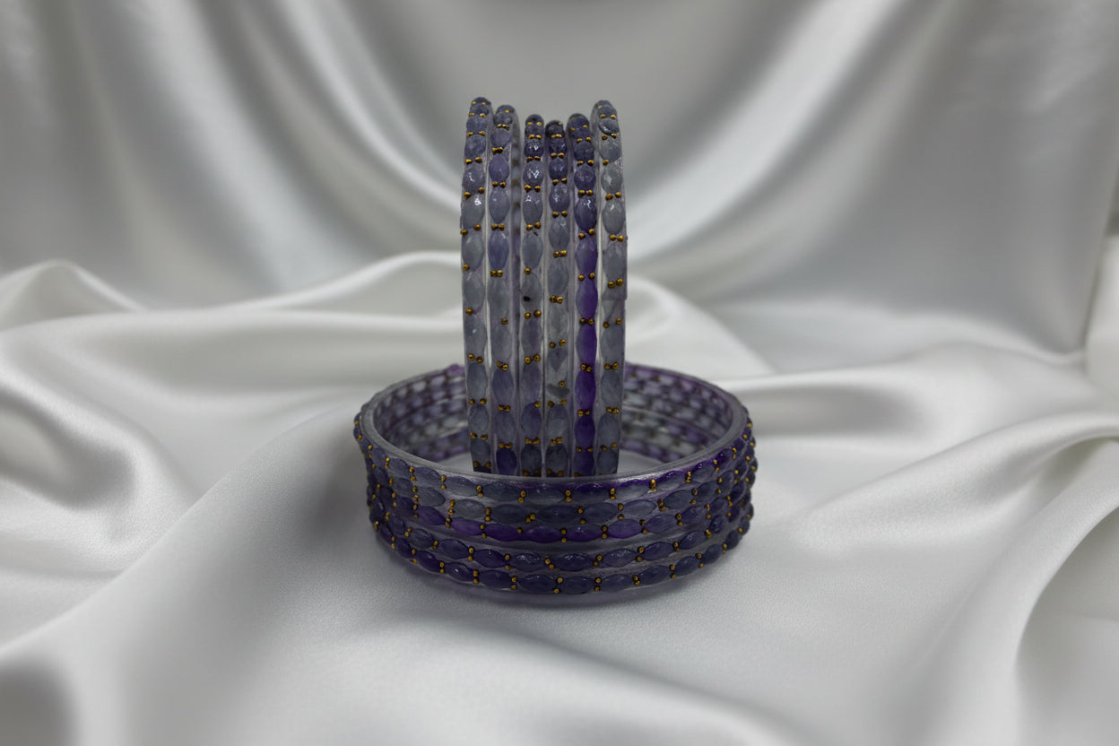 Beaded bracelet with a decorative stand on a gray background